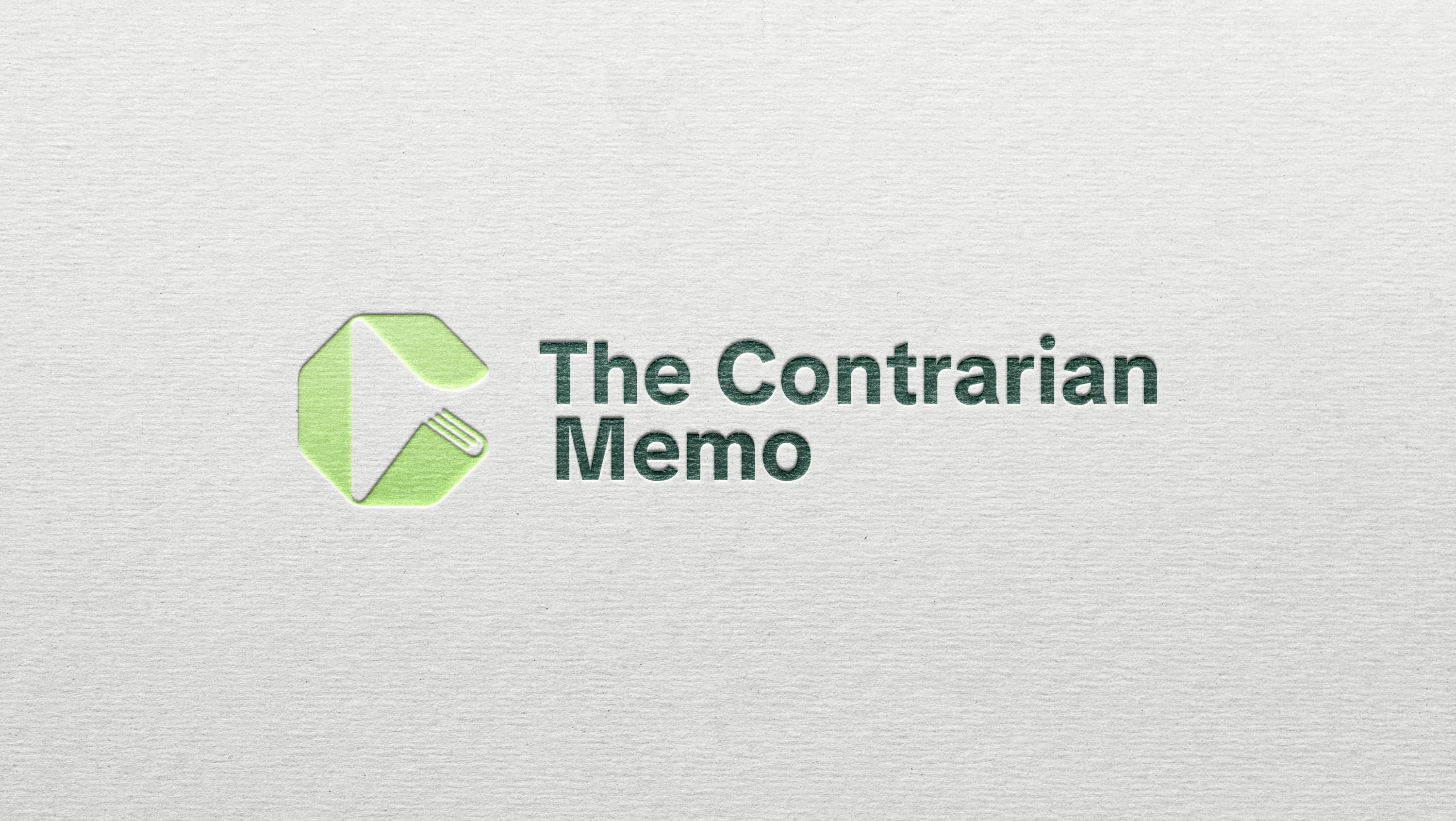 The Contrarian Memo logo lockup embossed on paper